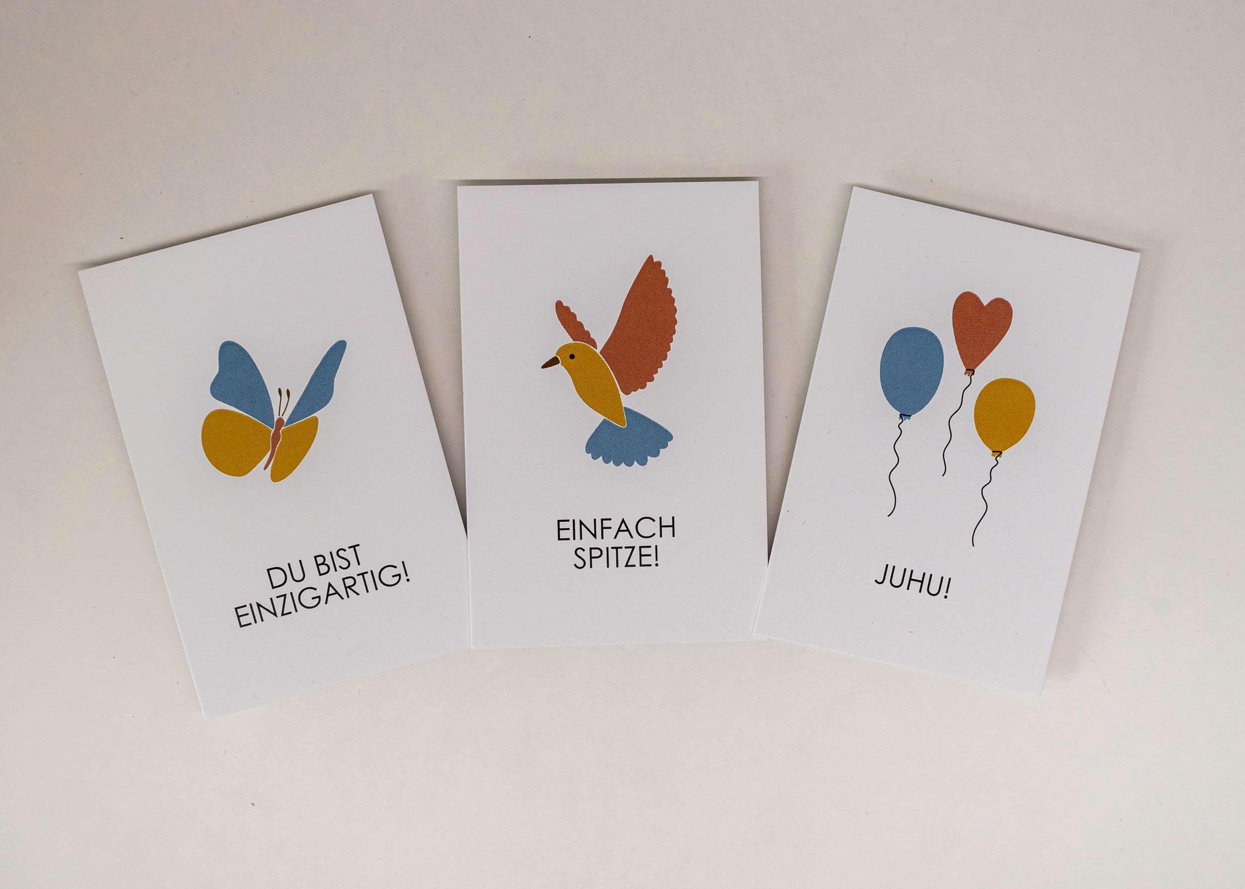 Bunte christliche Grußkarten mit Tiermotiven und persönlichen Nachrichten.