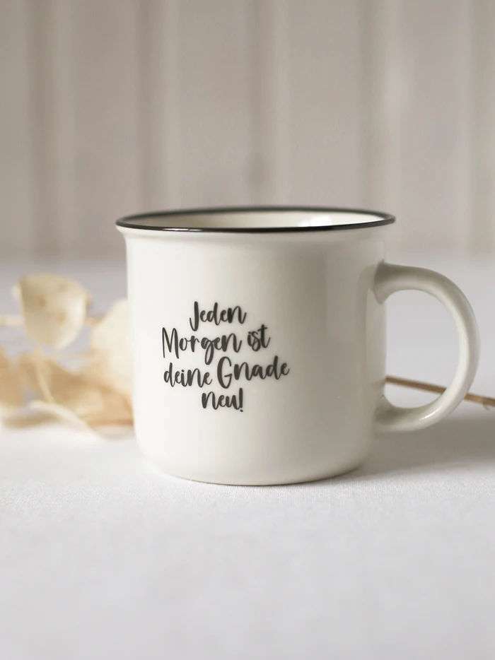 Tasse mit christlichem Spruch „Jeden Morgen ist deine Gnade neu!“.
