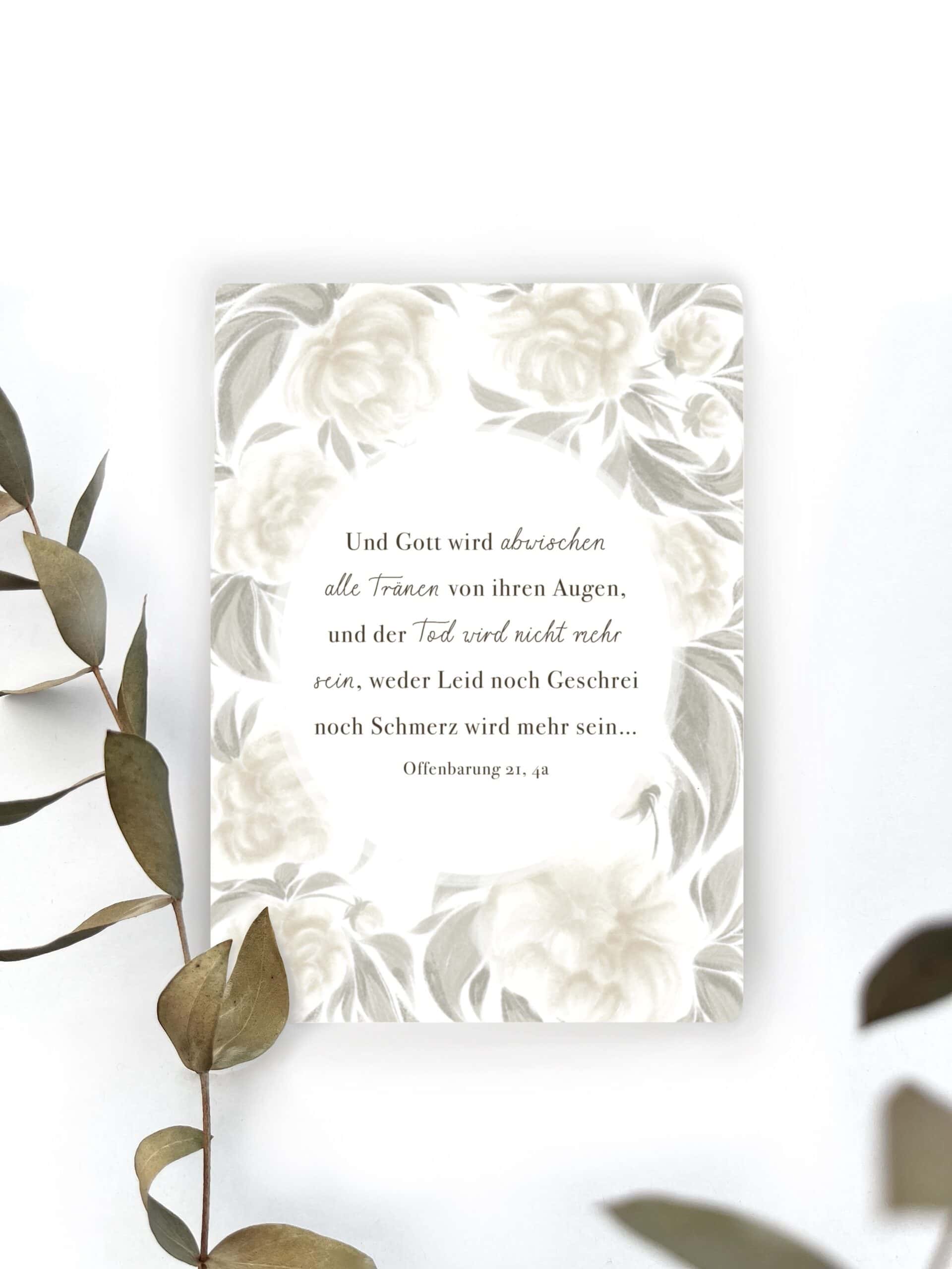 Trauerkarte mit Blumenmuster und tröstlichem Spruch, Beileidsgedicht, elegantes Design.